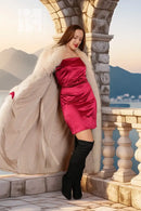 White mink fur coat with fox trim, draped shoulders, red satin dress and red cuffs