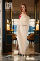 White mink fur coat with voluminous fox-trim collar and full-length front