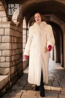 White mink fur coat with fox trim, front view with red cuff accents on sleeves