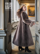 Side view full-length beaver coat with fold-back cuffs, dark taupe
