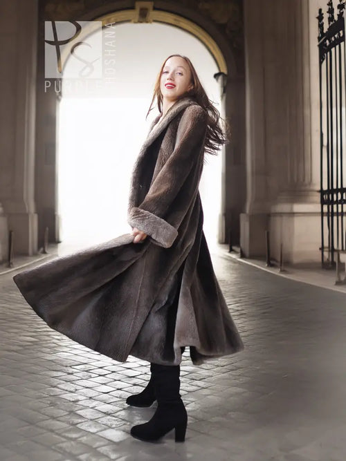 Sheared beaver full-length coat in dark gray with flared hem and fold-back cuffs