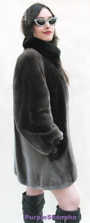 Dark beaver fur bomber coat with zip front, full sleeves, and relaxed side shape