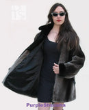 Dark beaver fur bomber coat with zip front, stand collar, and open side lining