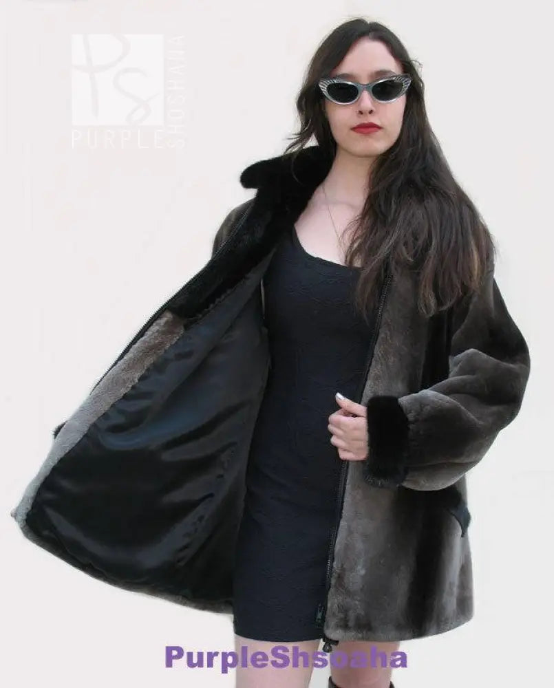 Dark beaver fur bomber coat with zip front, stand collar, and open side lining