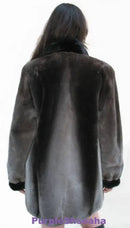 Back view of dark beaver fur bomber coat with stand collar and wide sleeves