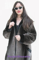 Dark beaver fur bomber coat with hood and front zipper, front close-up
