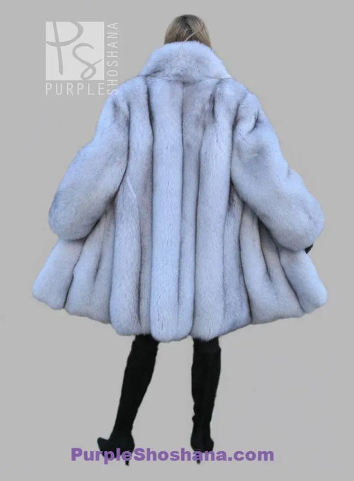 Light blue fox fur coat back view with wide shoulders and stand collar