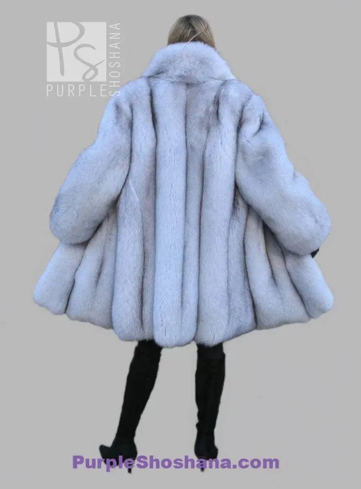 Light blue fox fur coat back view with wide shoulders and stand collar