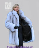 Light blue plush fox fur coat front view with stand collar and long sleeves