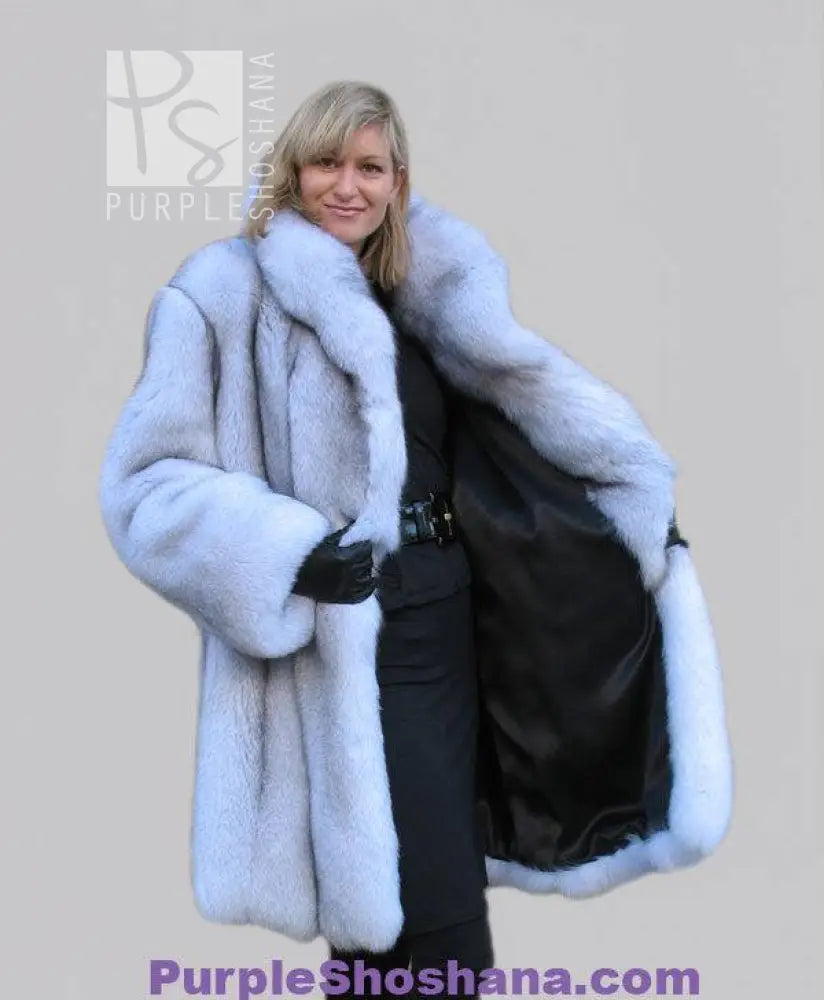 Light blue plush fox fur coat front view with stand collar and long sleeves