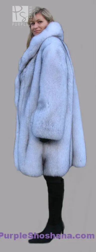 Light blue fox fur coat shown from the side with full sleeves and stand collar