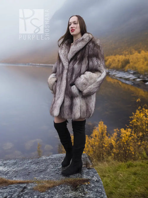 Light gray plush fur coat with shawl collar, long sleeves, and relaxed fit