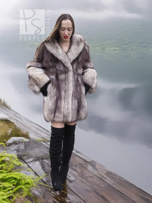 Light gray plush fur coat with shawl collar, long sleeves, and side pockets