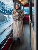Large plush fur coat with shawl collar, gray-brown, long sleeves and straight hem