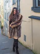 Raccoon fur coat with open front and long textured panels, brown.