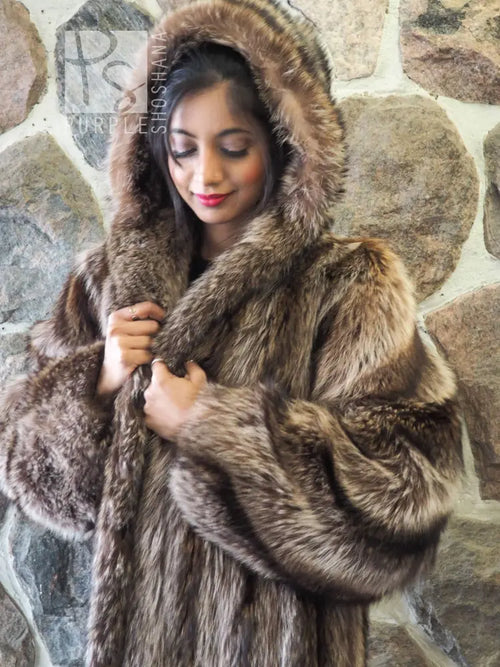 Raccoon fur coat with hood, close-up of collar and front fastening