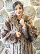 Brown raccoon fur coat with oversized hood and front zip, soft brushed texture