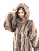 Raccoon fur coat with hood, close-up showing hood framing around face