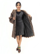 Raccoon fur coat with hood, open front revealing dark lining