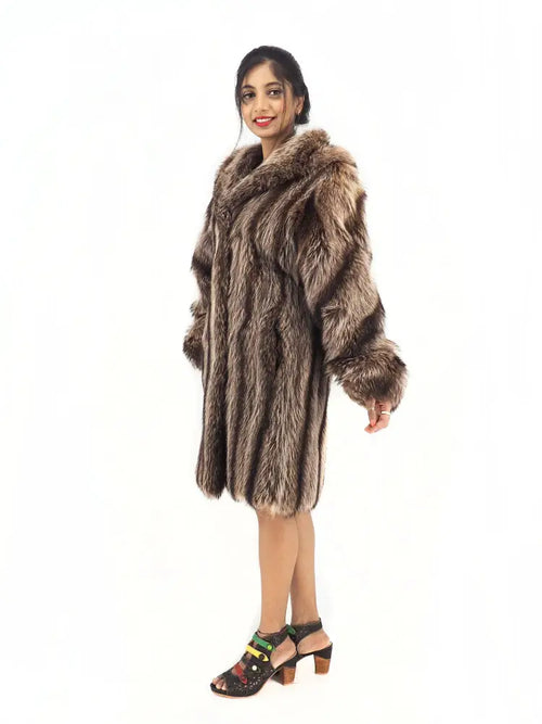 Raccoon fur coat with hood, side profile view with long front length