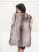 Back view of unisex raccoon fur vest with light fur trim on shoulders