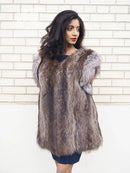 Raccoon fur vest with fox-fur trim, sleeveless V-neck, gray-brown, front view