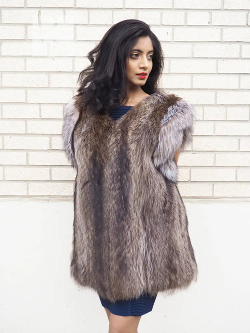 Raccoon fur vest with fox-fur trim, sleeveless V-neck, gray-brown, front view