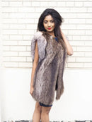 Unisex raccoon fur vest in dark taupe gray with light fur trim along edges