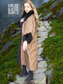 Reversible water-repellent tan coat with black plush cuffs and hem trim.