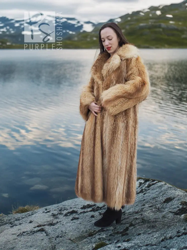 Raccoon fur coat, front view with thick cuffs and wide collar