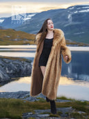 Raccoon fur coat in tan with a wide shawl collar and long sleeves, full-length view.