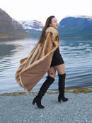 Raccoon fur coat, side view with draped sleeves and long hem