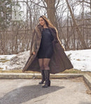 Reversible raccoon fur coat with dark outer layer and light fur hood trim, open front
