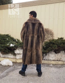 Rear view of long raccoon-fur coat in dark brown with full length panels