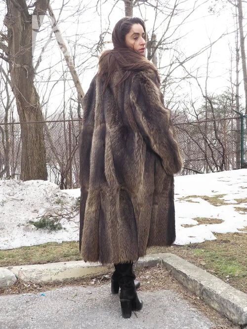 Long raccoon-fur coat with high collar and structured sleeves, dark brown