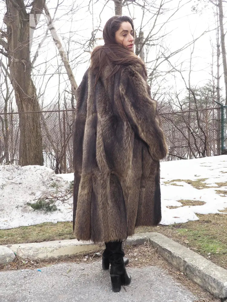Long raccoon-fur coat with high collar and structured sleeves, dark brown