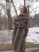 Raccoon fur coat with wide hood collar and toggle front, side view in brown fur