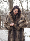 Reversible raccoon fur coat close-up: hooded collar, toggle fasteners, brown fur texture