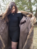 Raccoon-fur coat with open front showing lighter reverse panel and fur trim