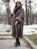 Long raccoon-fur coat with fur collar and cuff trim, dark brown exterior