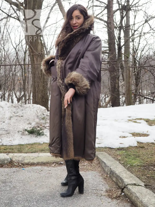Long raccoon-fur coat with fur collar and cuff trim, dark brown exterior