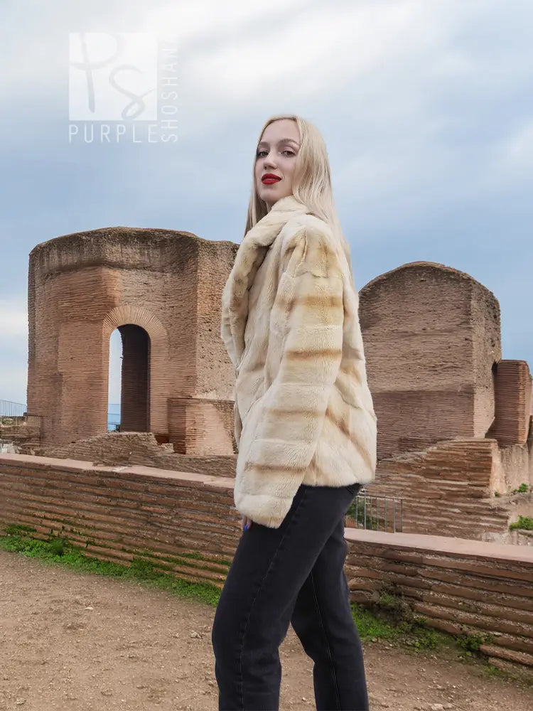 Light beige mink fur jacket with long sleeves and stand collar, side view
