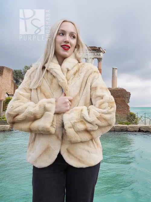 Light beige mink fur jacket with full sleeves and button placket, close front view