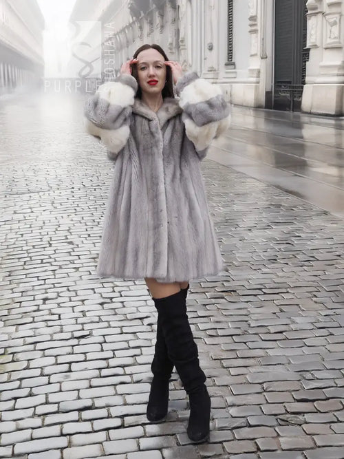 Light gray mink fur coat with wide collar and cream sleeve panels, front view