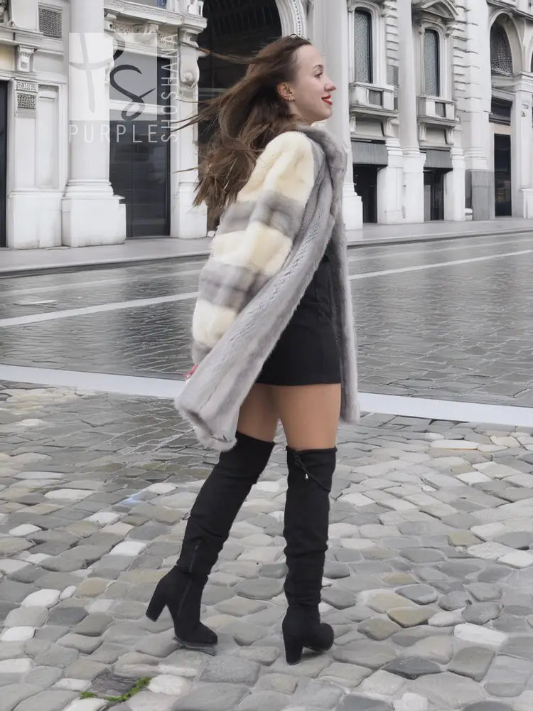 Light gray mink fur coat with cream block panels and hood; long sleeves