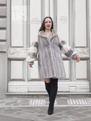 Light gray mink fur coat with wide collar and cream sleeve panels, front view