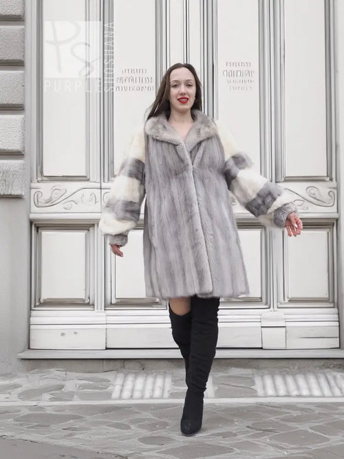 Light gray mink fur coat with wide collar and cream sleeve panels, front view