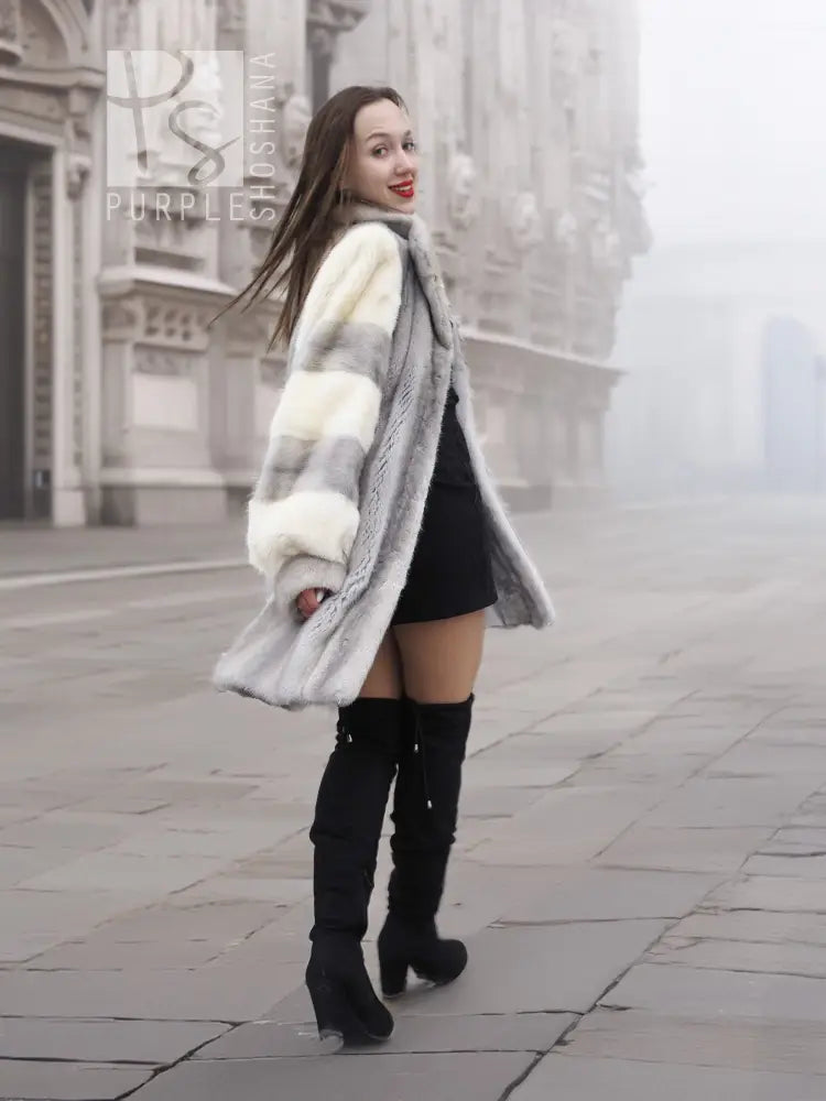 Mink fur coat with light and dark fur panels, open front and wide cuffs