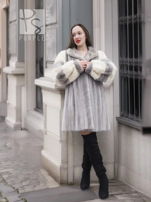 Light gray mink fur coat with wide collar and cream sleeve accents, standing front