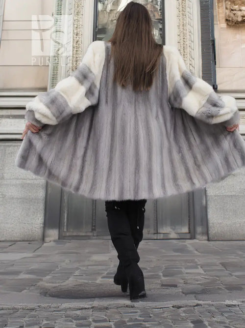 Back view of light gray mink fur coat with wide collar and cream sleeve cuffs
